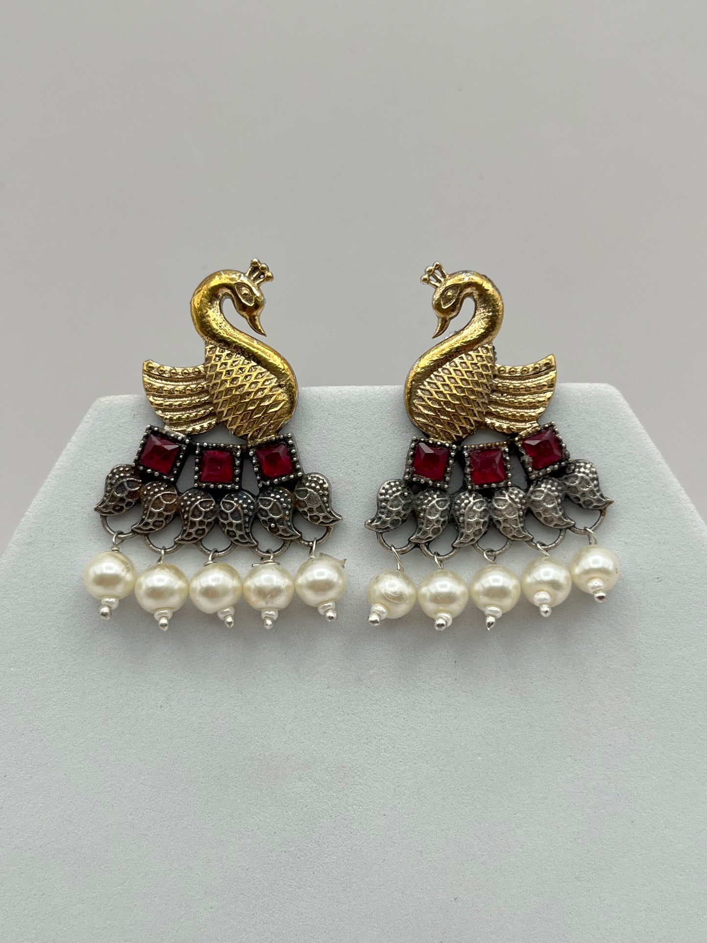 Vrishika Swan shape Pink stone Dual Tone earrings