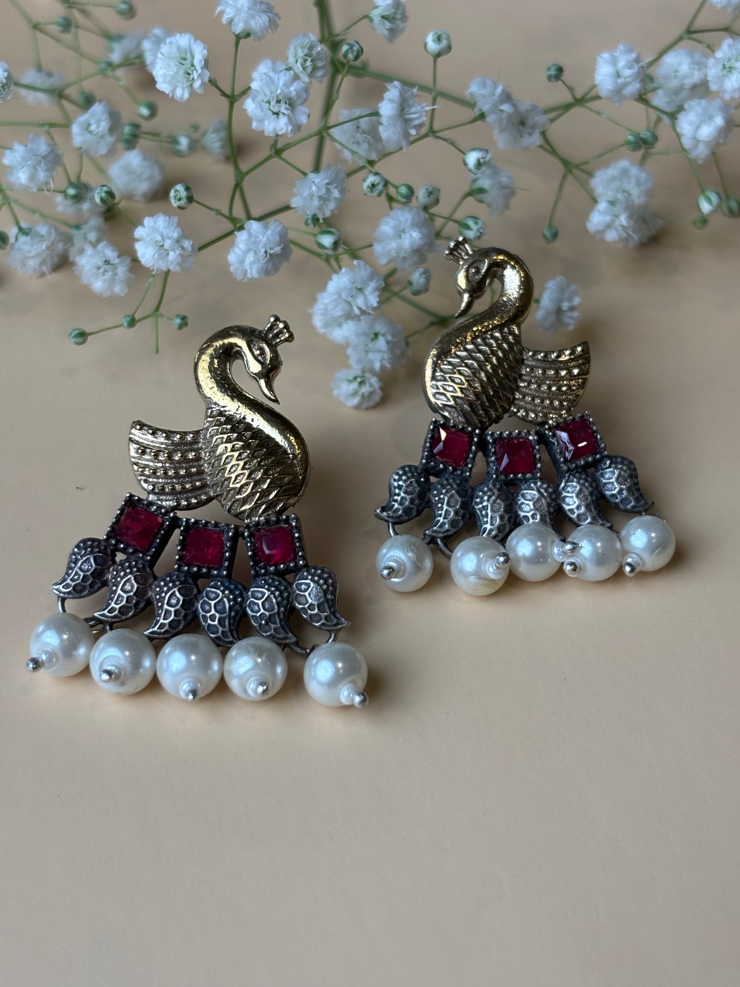 Vrishika Swan shape Pink stone Dual Tone earrings