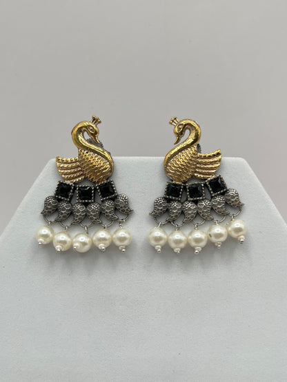 Vrishika Swan shape Black stone Dual Tone earrings