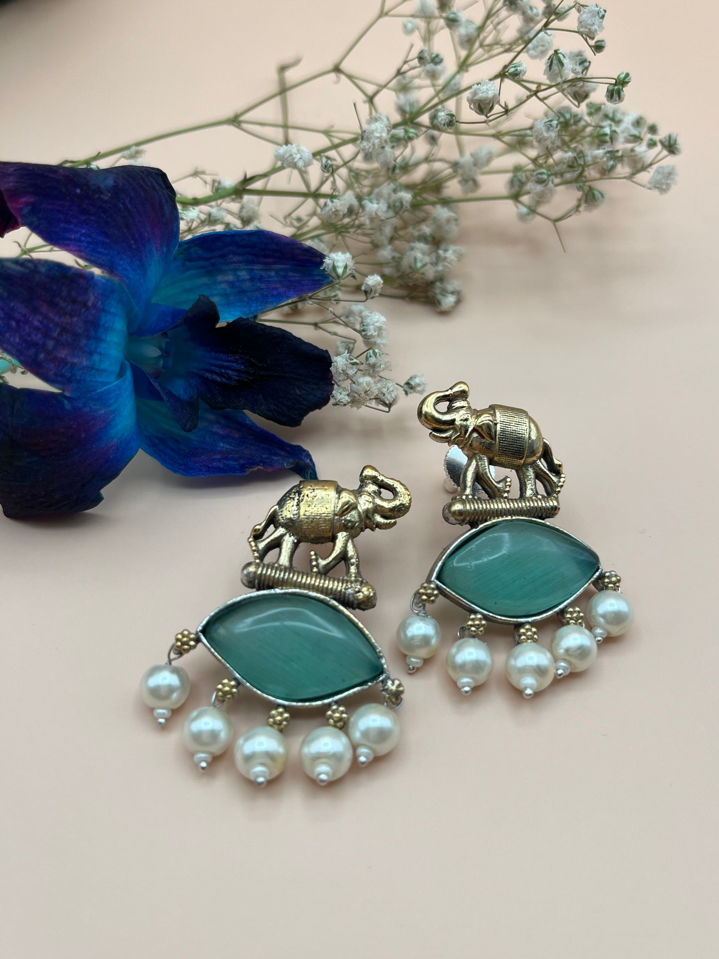 Sanika Sea Green Elephant Dual Tone Earrings